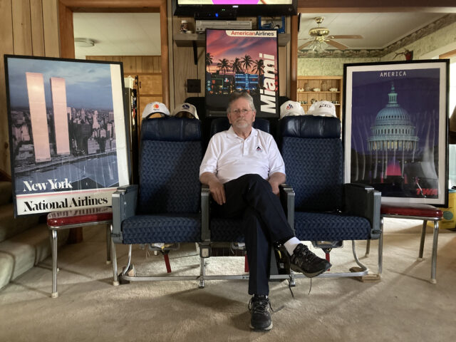 Bruce Hopkins Sitting in Airliner Seats