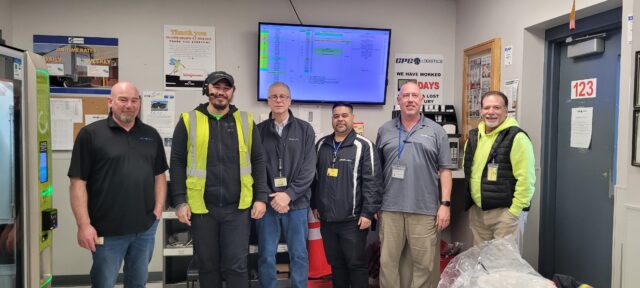 Operations Manager Bill Baines, Darius Wilson, Walgreens Northeast Director of Logistics Ed Schultes, Division Manager Allan Flores, Safety Supervisor Carmen Parisio, and Safety Manager Joe Cosenza