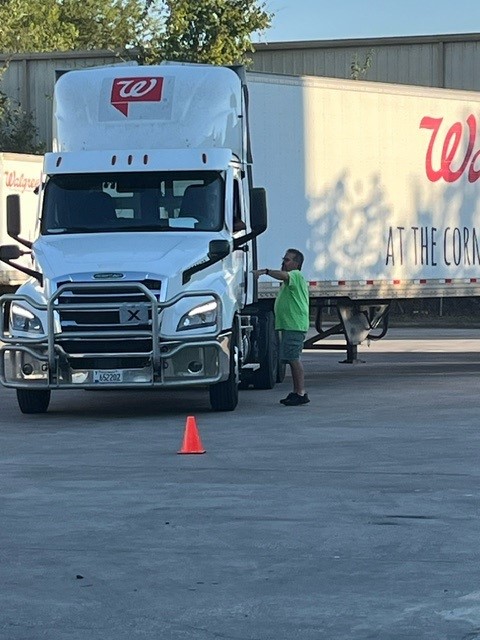 Safety Manager John Schlichter instructs a driver. 