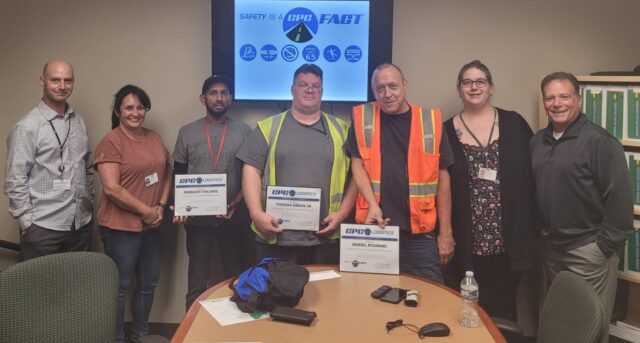 From left: Barnes & Noble Distribution Center Manager Frank Friel, Barnes & Noble Logistics Assistant Evett Rivera, Parkash Tirlokie, Thomas Green, Daniel Rysinski, Joy Rojas and CPC Safety Manager Joe Cosenza