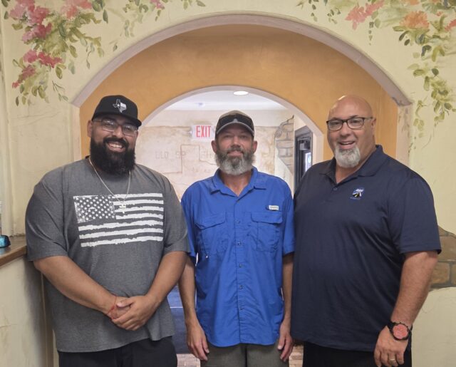 From left: Bryan Washington, Allen Thompson and Regional Manager Rick Weiher