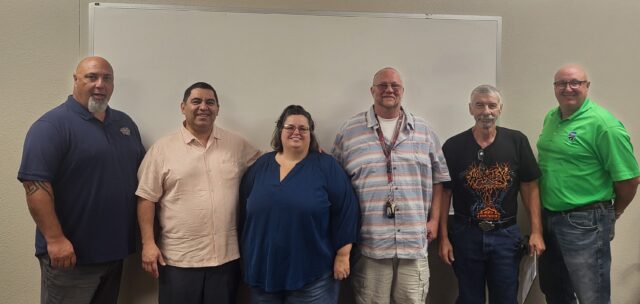 From left: Regional Manager Rick Weiher, Jeronimo Orona, Shannon Orona, Curt Bauer, Gary Kirschenman and Division Manager Richard Jones