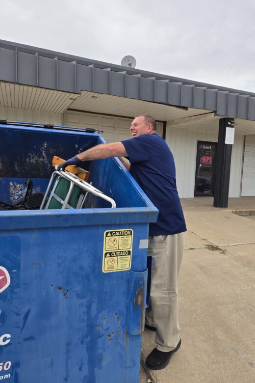 Kevin Adams fishes for a chair for his boss, Richard Jones