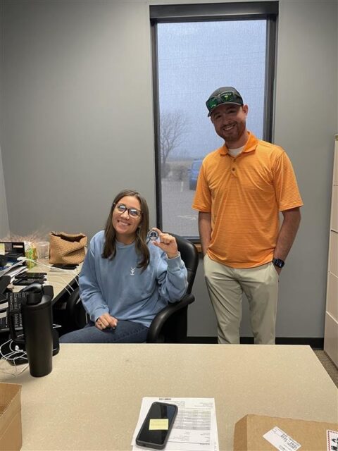 Emily Decap (left) with John Deere Fleet Manager Lance Burnett