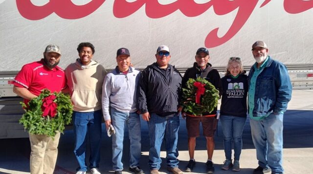 Rene Conde and Brian White with volunteers