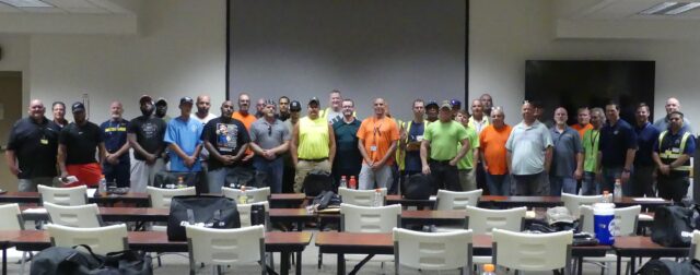 The Perrysburg team at a safety meeting