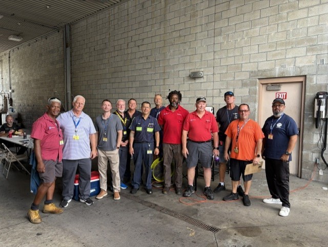 From left: Wilner Dhaiti, Walgreens Logistics Manager Joe Catalfamo, Walgreens Senior Manager of Regional Transportation Enablement Zach Rizzi, CPC Division Manager Ken Pruitt, Transervice Shop Manager William Hulka, Walgreens Shop Mechanic Vega, CPC Regional Safety Manager Art Swank, Dwayne Williams, Ed Quinn, Glen Stege, Chris Akins and CPC Regional Manager Mark Echevarria