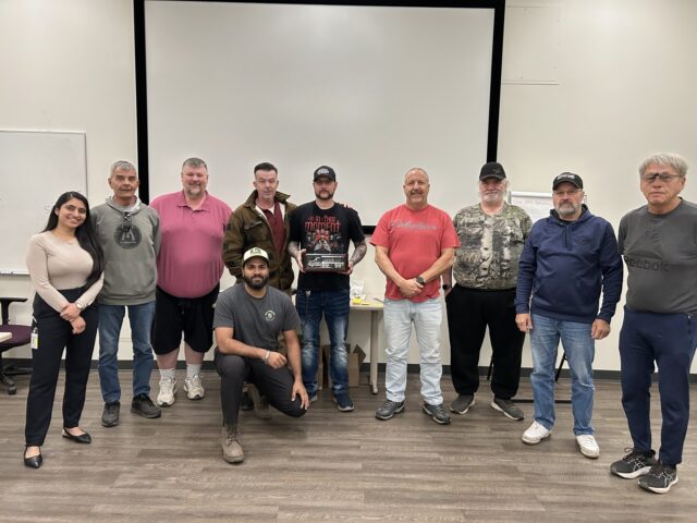 Pictured (from left): CPC Dispatcher Rajveer Kaur, Greg Fayant, Arnold Reeve, Fleet Safety Manager Steven Nicholson, Ryan McDonald, Donny Thomson, Rob Sopp, Ken McDonald, Stan Jeannotte and Manjot Katri (kneeling). 